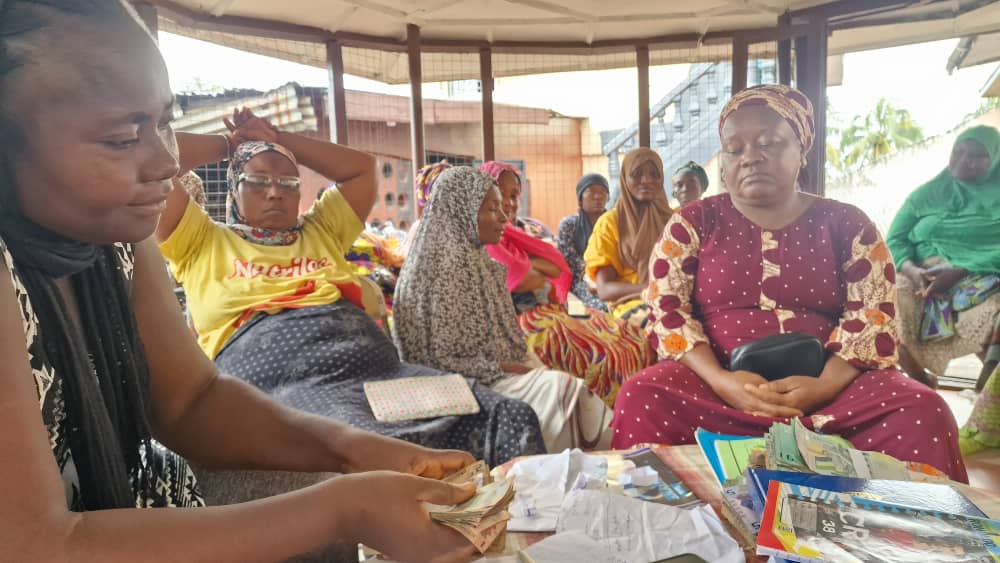 Women gathered at a CMMWPD - SL community outreach meeting