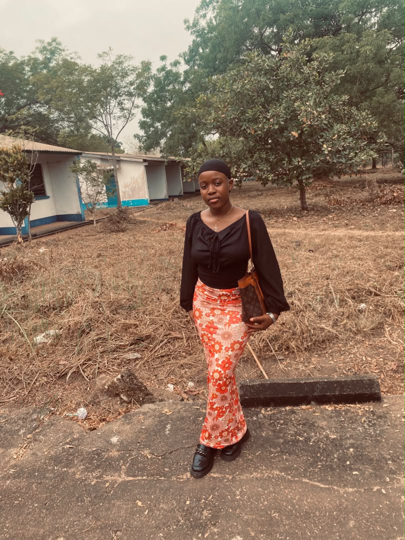 Fatmata Sandy standing outdoors on the Njala University Mokonde Campus